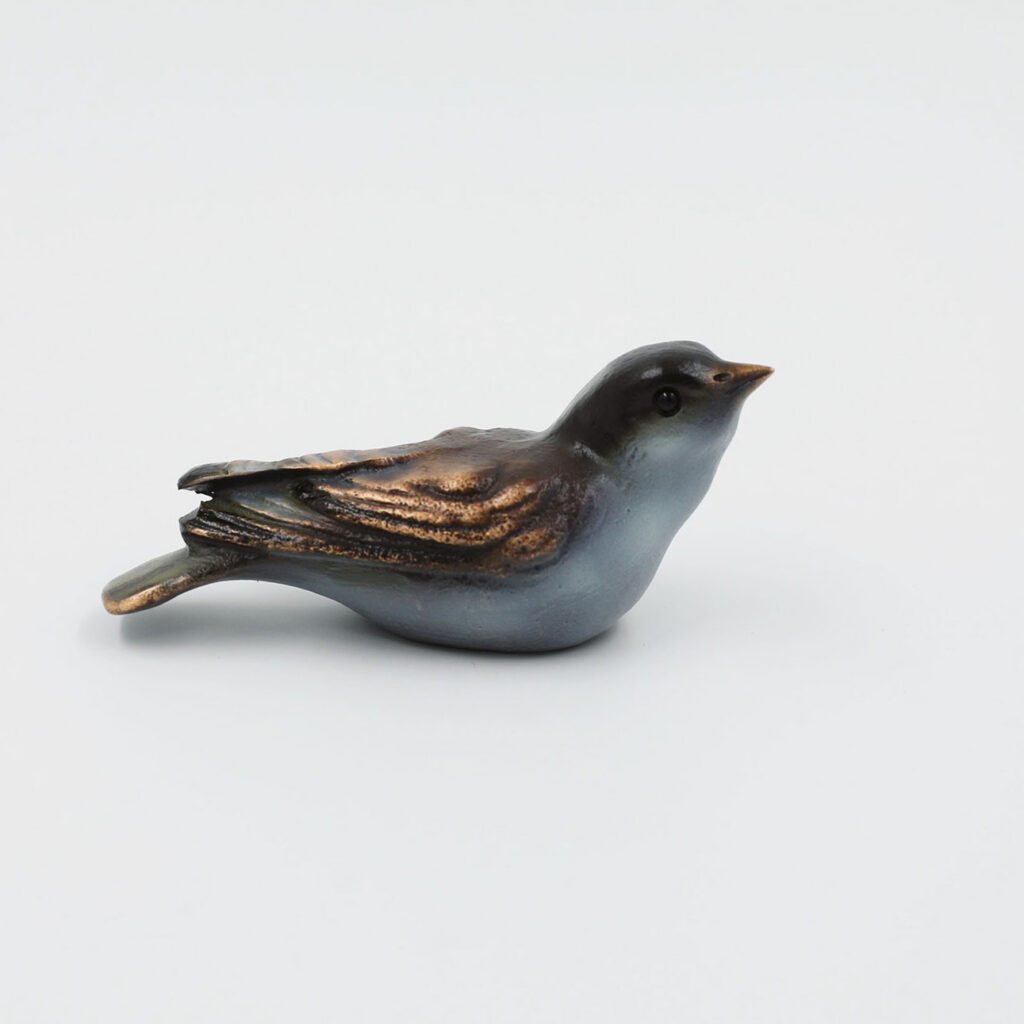 Bronze-Vogel handbemalt